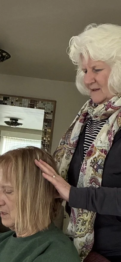 Beth Daily performs Alexander Technique on senior.