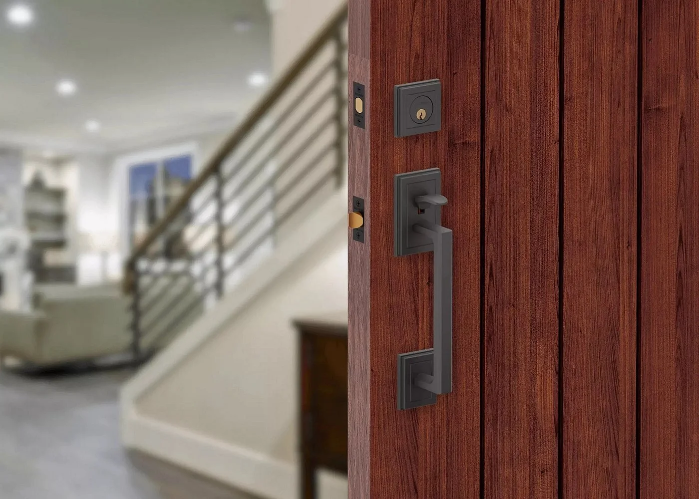 Close-up of a wooden door with house-like door handle, lock, and security system, in a blurred interior background.