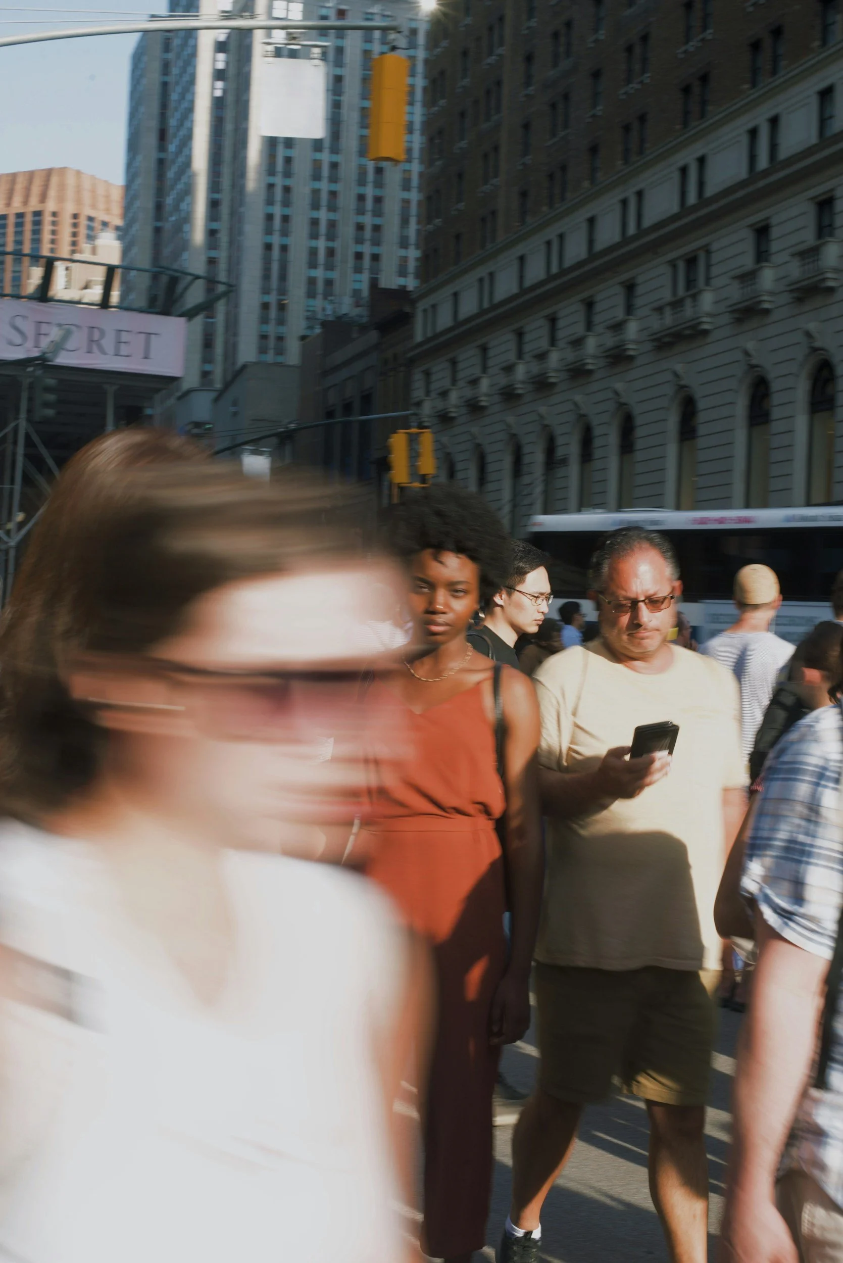 film of photo of people walking in a city
