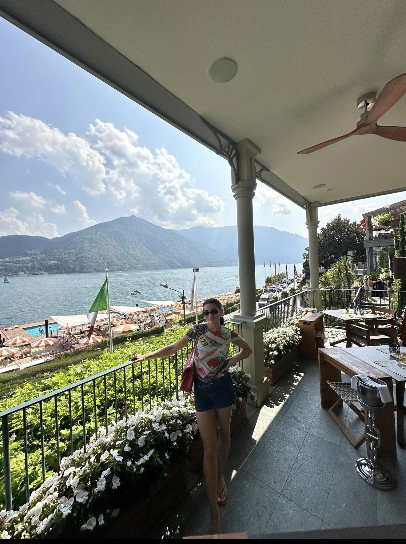 Stephanie on a hotel terrace overlooking Lake Como.
