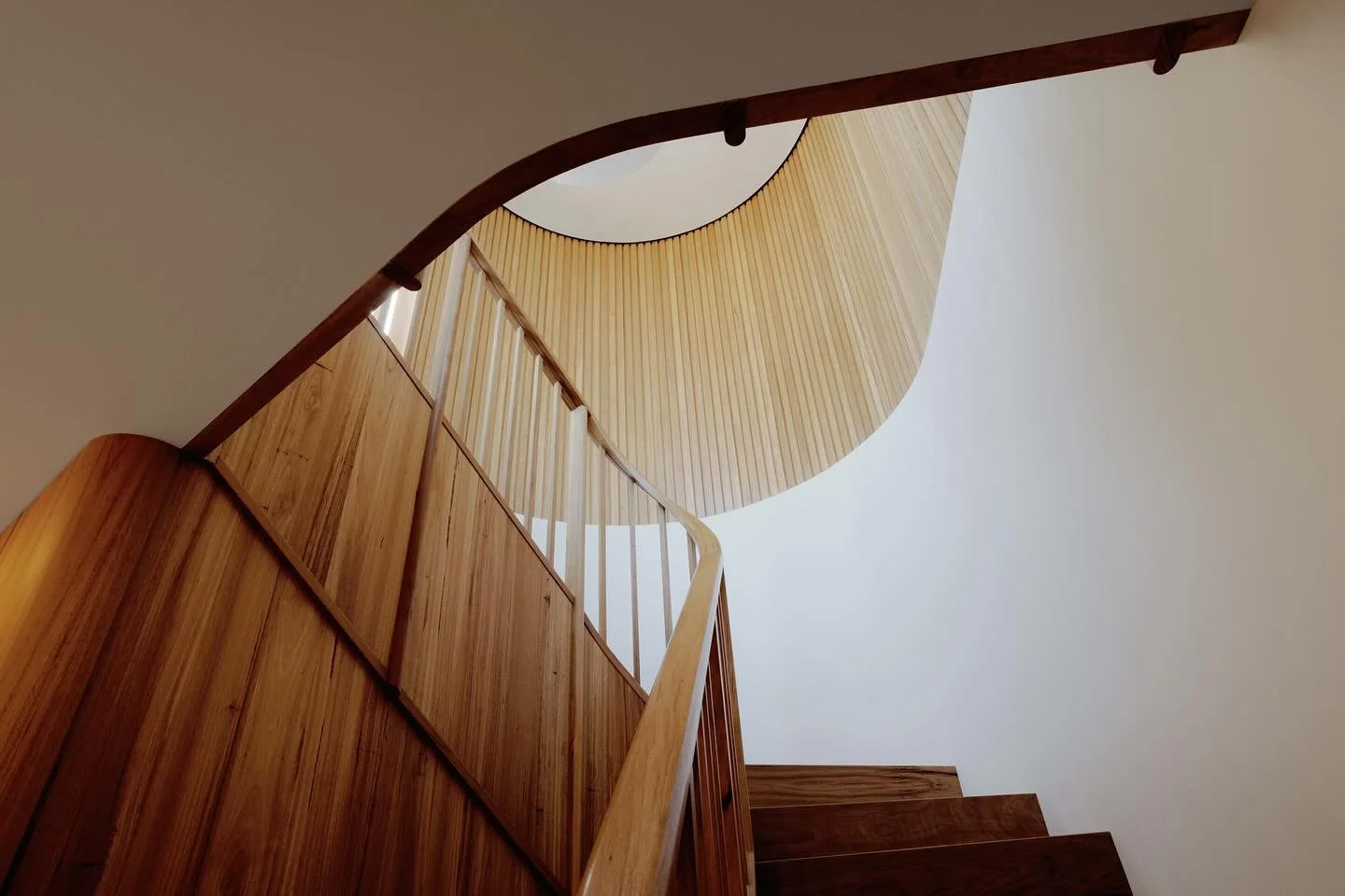 A sculptural timber stair connects living from sleeping, and kids quarters from the parent&rsquo;s wing. We imagined the stair as the central crossover space where family members would pass, meet and talk between the two levels as they prepare for a 