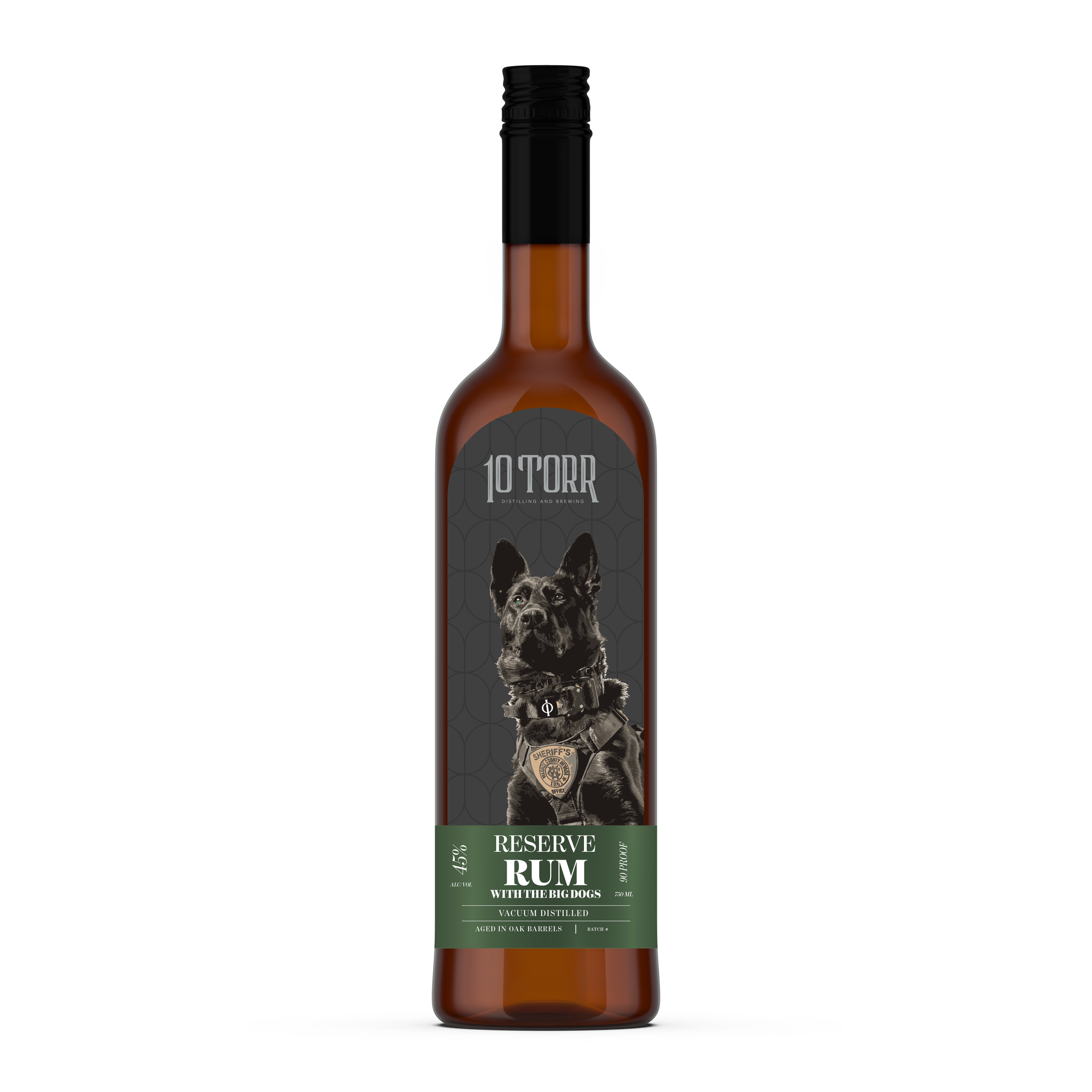A bottle of Reserve Rum with a black and green label, featuring an illustration of a dog in a police badge, and text indicating it is aged in oak barrels and distilled in vacuum.