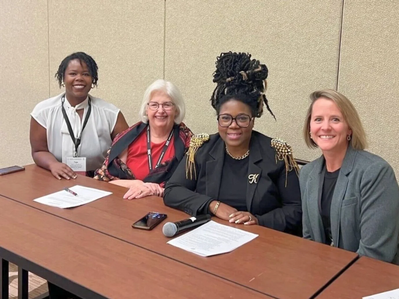 RBIJ Inclusive Hiring Manager Taja Hereford  (left) led a panel discussion at the National Reentry Workforce Collaborative's annual conference, exploring strategies to break down barriers and support successful reentry.