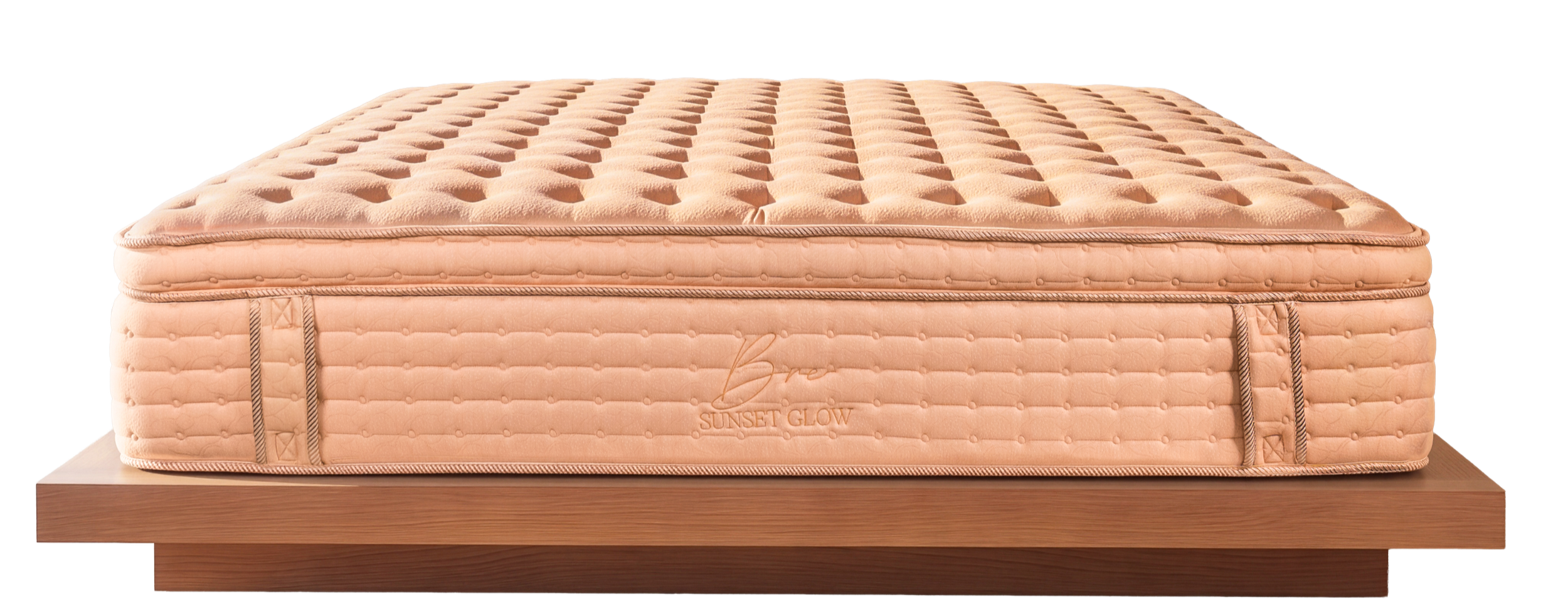 A peach-colored mattress on a wooden bed frame.