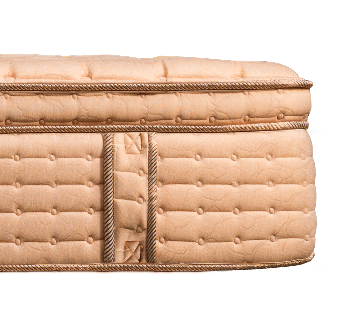 Side profile of the 14-inch Sunset Glow luxury mattress, featuring a blush-pink Euro top, quilted side panels, and a reinforced handle.