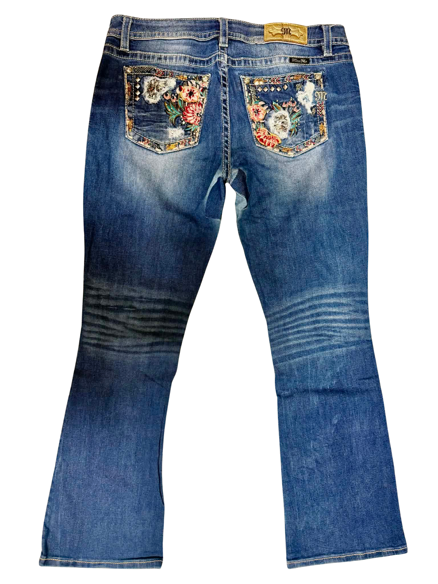 Women's Y2K blue denim flare jeans with colorful floral embroidered back pockets, decorative studs and distressed wash, wholesale OC Rag House.