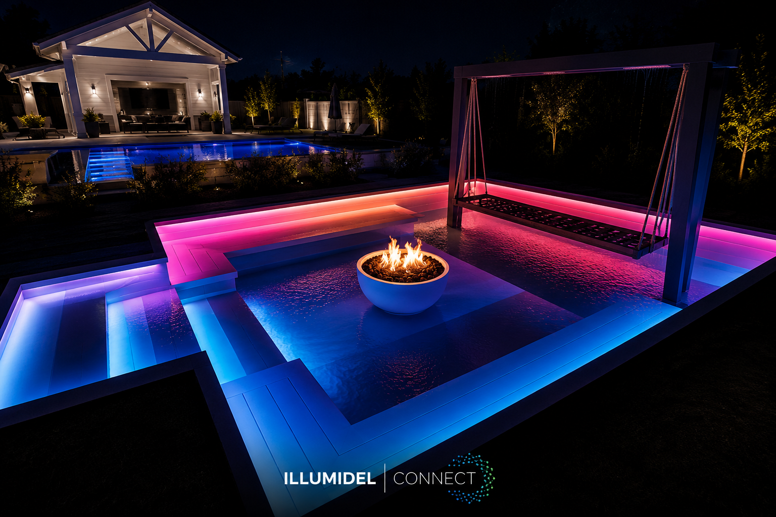 A backyard at night with a modern pool and a fire feature in the center. The pool is lit with blue and pink LED lighting, and there is a swing with pink lighting hanging above the water. In the background, houses are visible, illuminated with warm lighting.