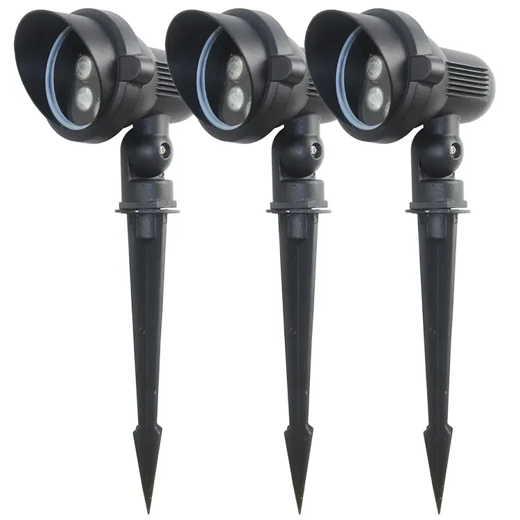 Three outdoor landscape lights with stakes for ground installation