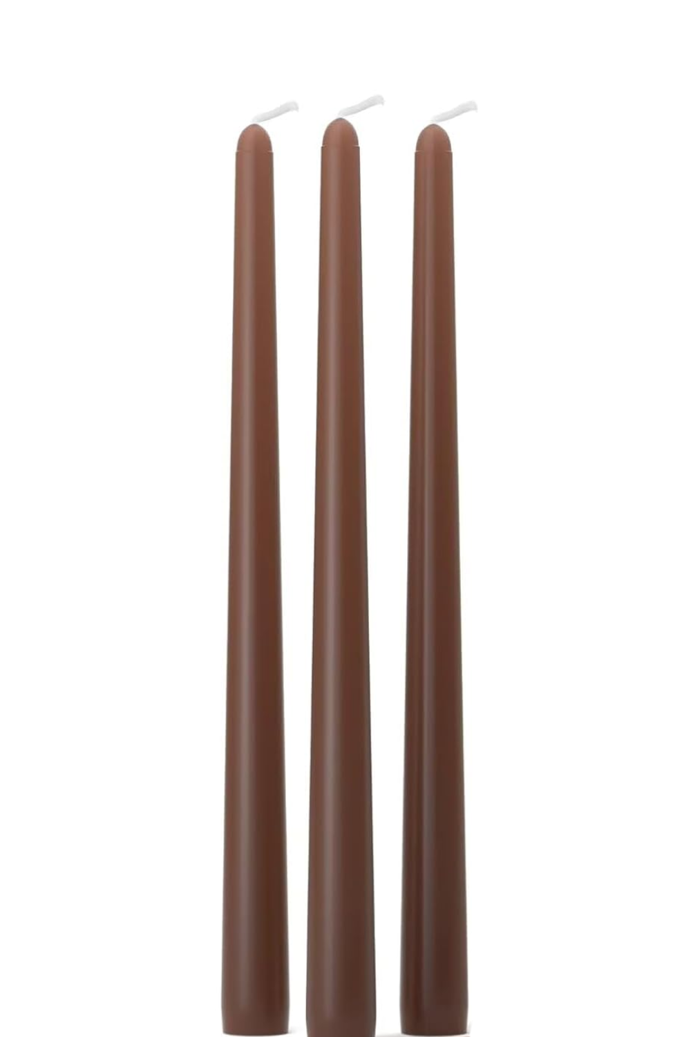 Three unlit brown candles with white wicks, standing upright on a white background.