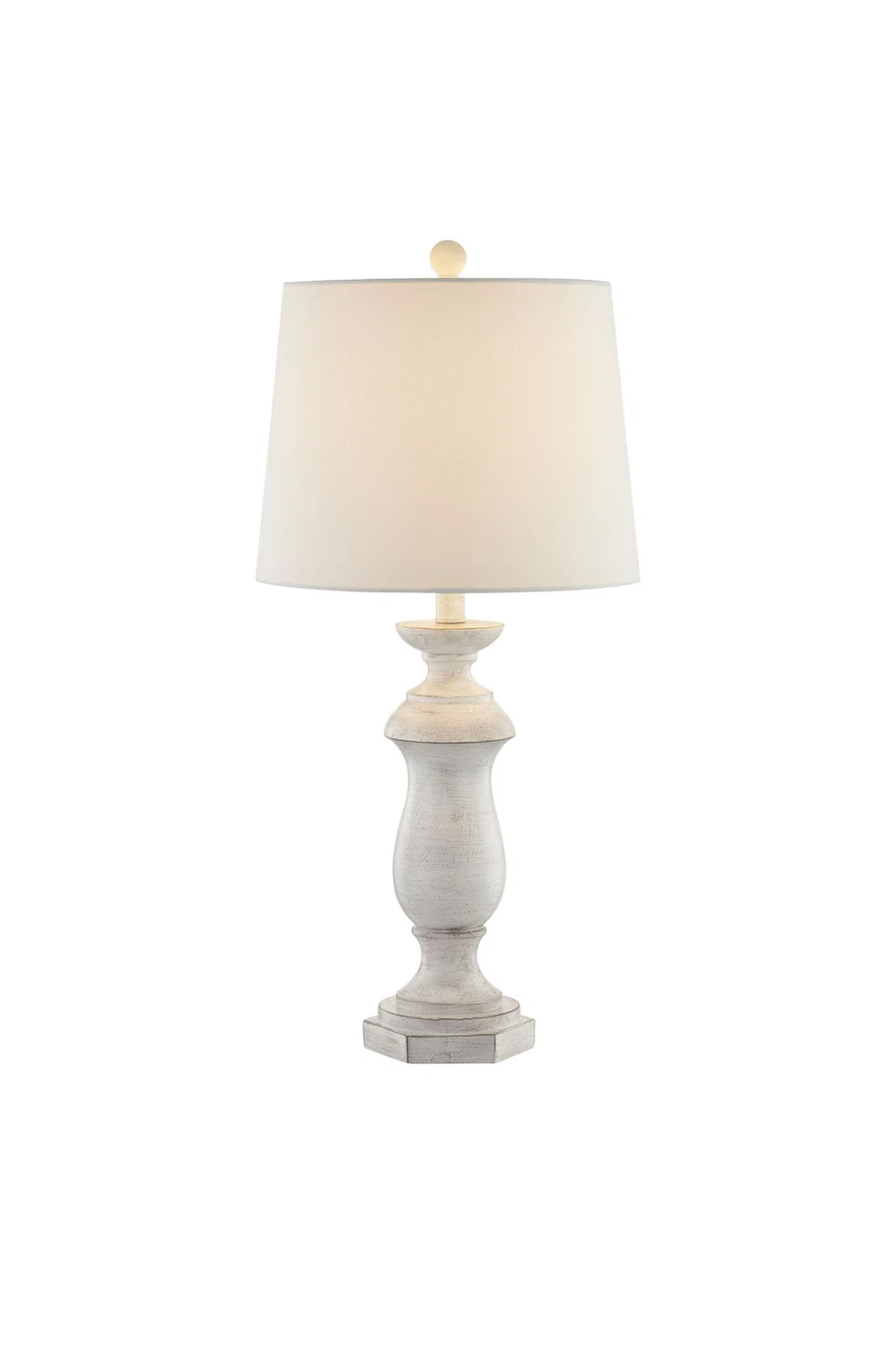 White table lamp with a fabric lampshade and a distressed wooden base.