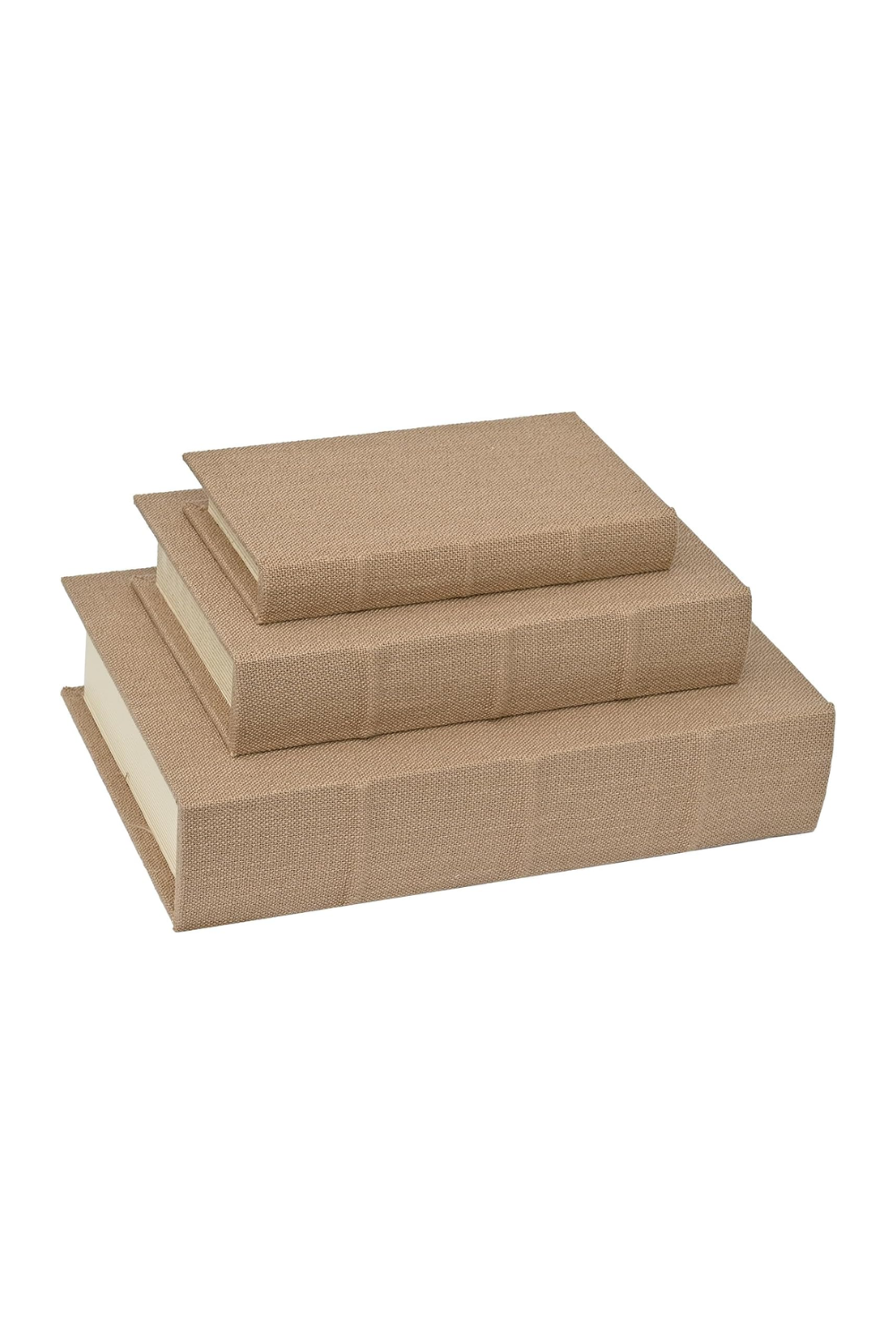 Three stacked beige cardboard boxes of different sizes, possibly used for storage or organization.