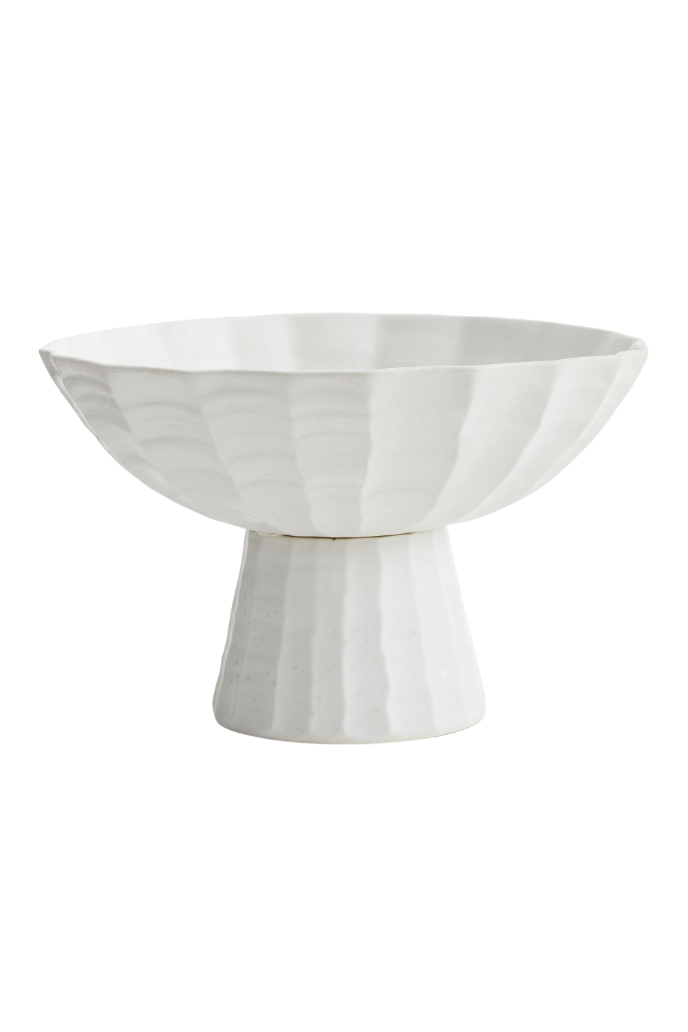 A white ceramic pedestal bowl with a textured vertical striped pattern