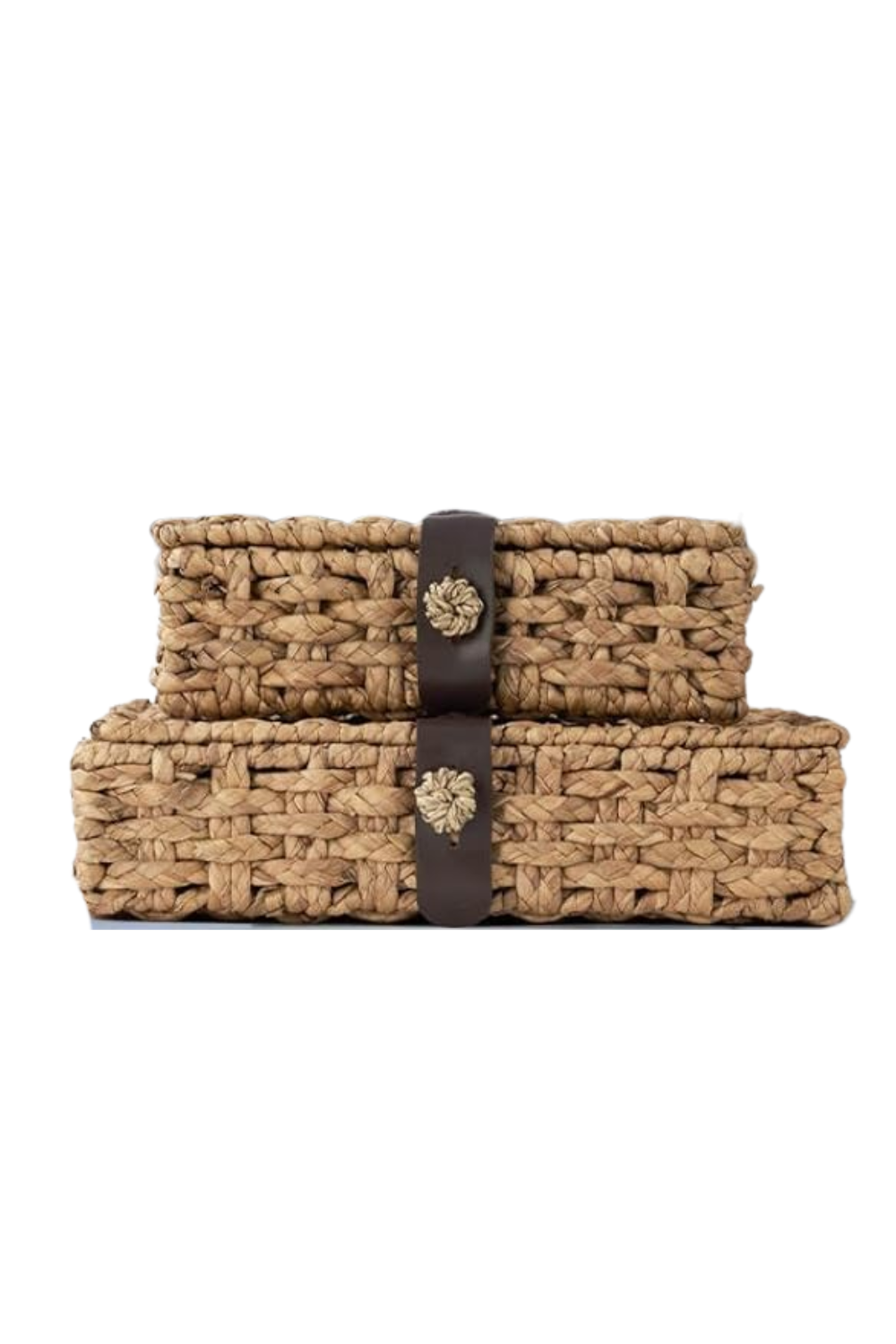 Two woven straw handbags stacked and held together with a dark strap featuring decorative metallic buttons.