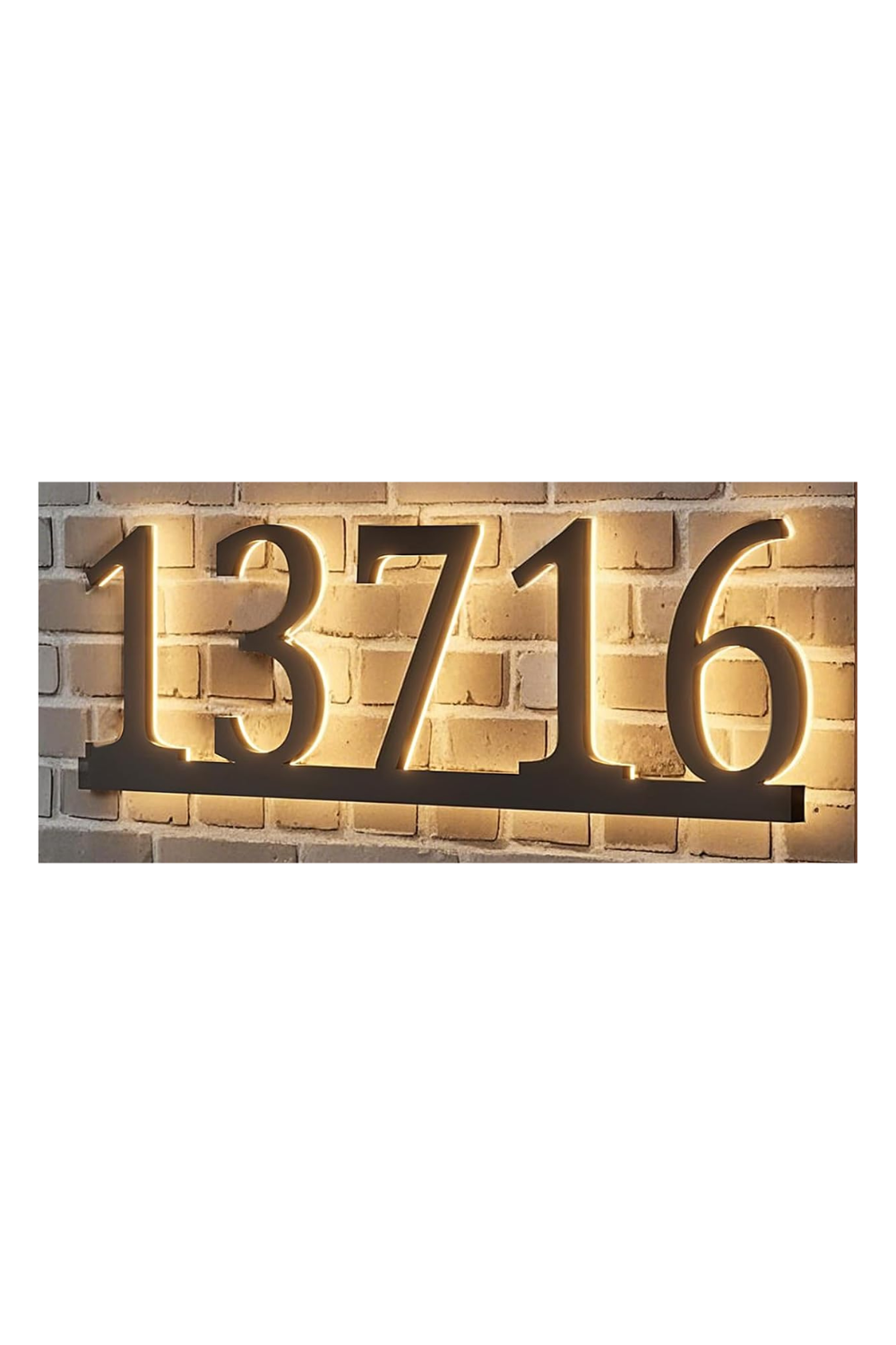  illuminated house number 13716 mounted on a brick wall.