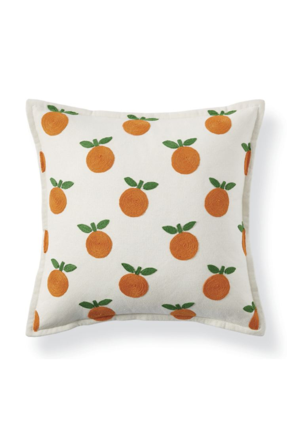 White decorative pillow with orange fruit pattern and green leaves.