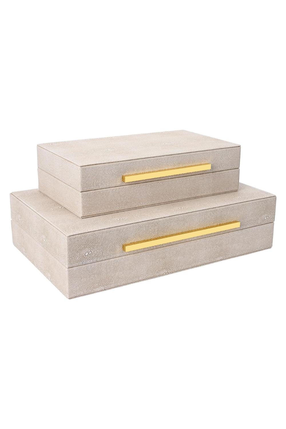 Three stacked jewelry boxes with golden handles against a white background.