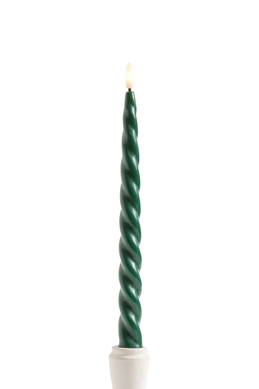 Green spiral birthday candle with a small flame on top, placed in a white holder.