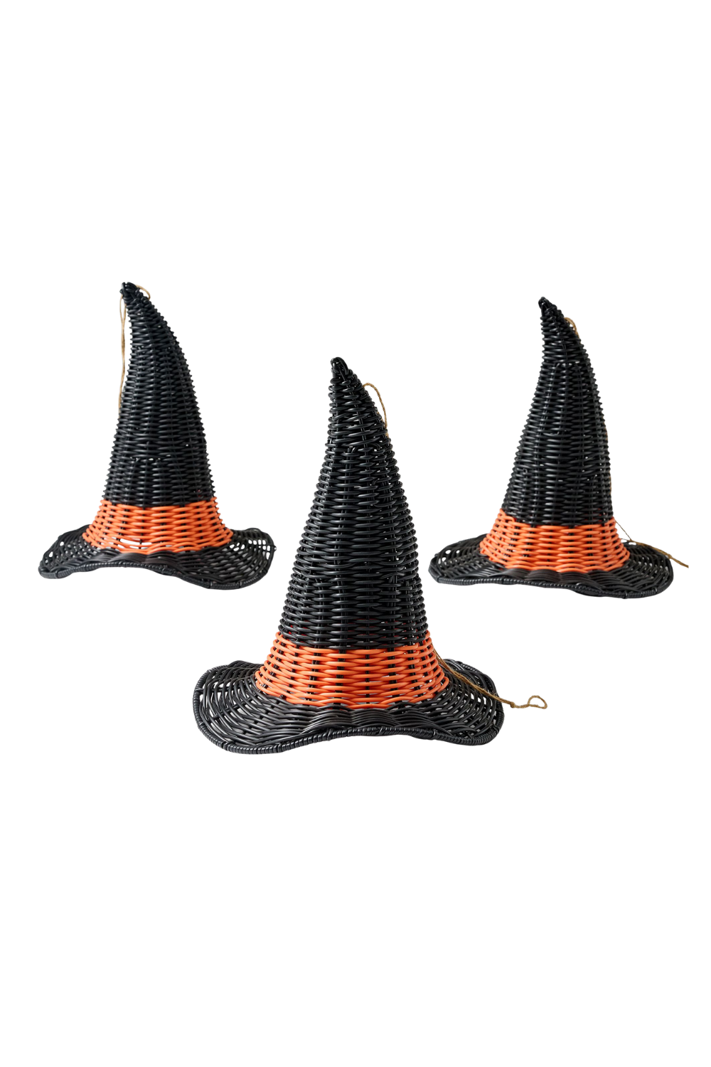 Three black and orange witch hats made of woven material, arranged against a white background.