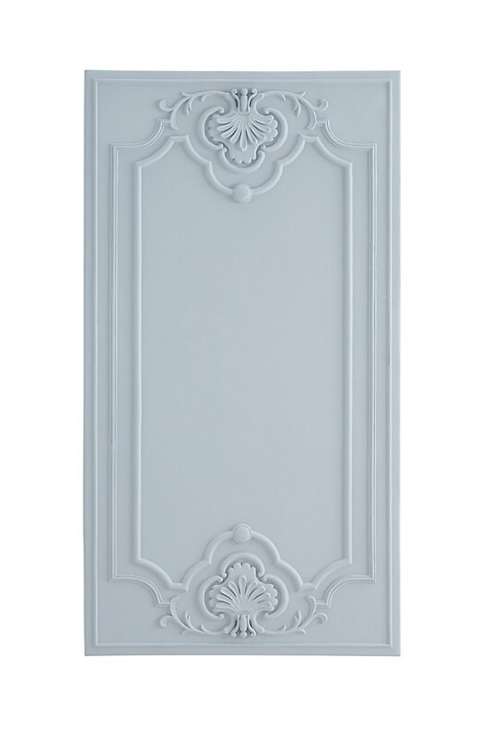 A plain, light blue decorative door with ornate molding and floral accents at the top and bottom.