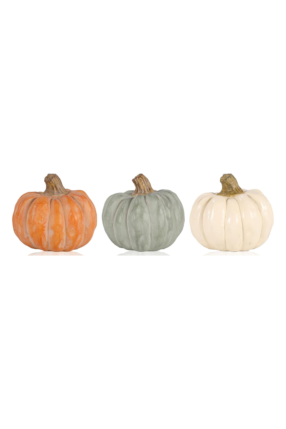 Three decorative pumpkins in orange, green, and white colors, arranged in a row against a white background.