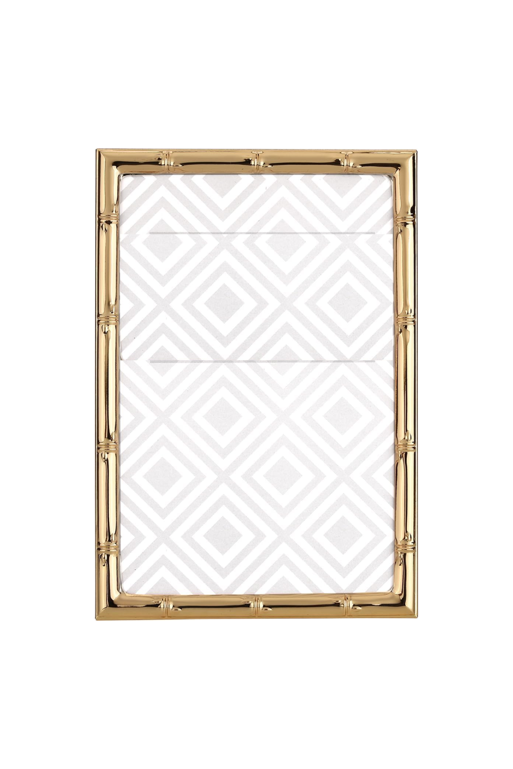 Gold framed mirror with bamboo-style design on a white background
