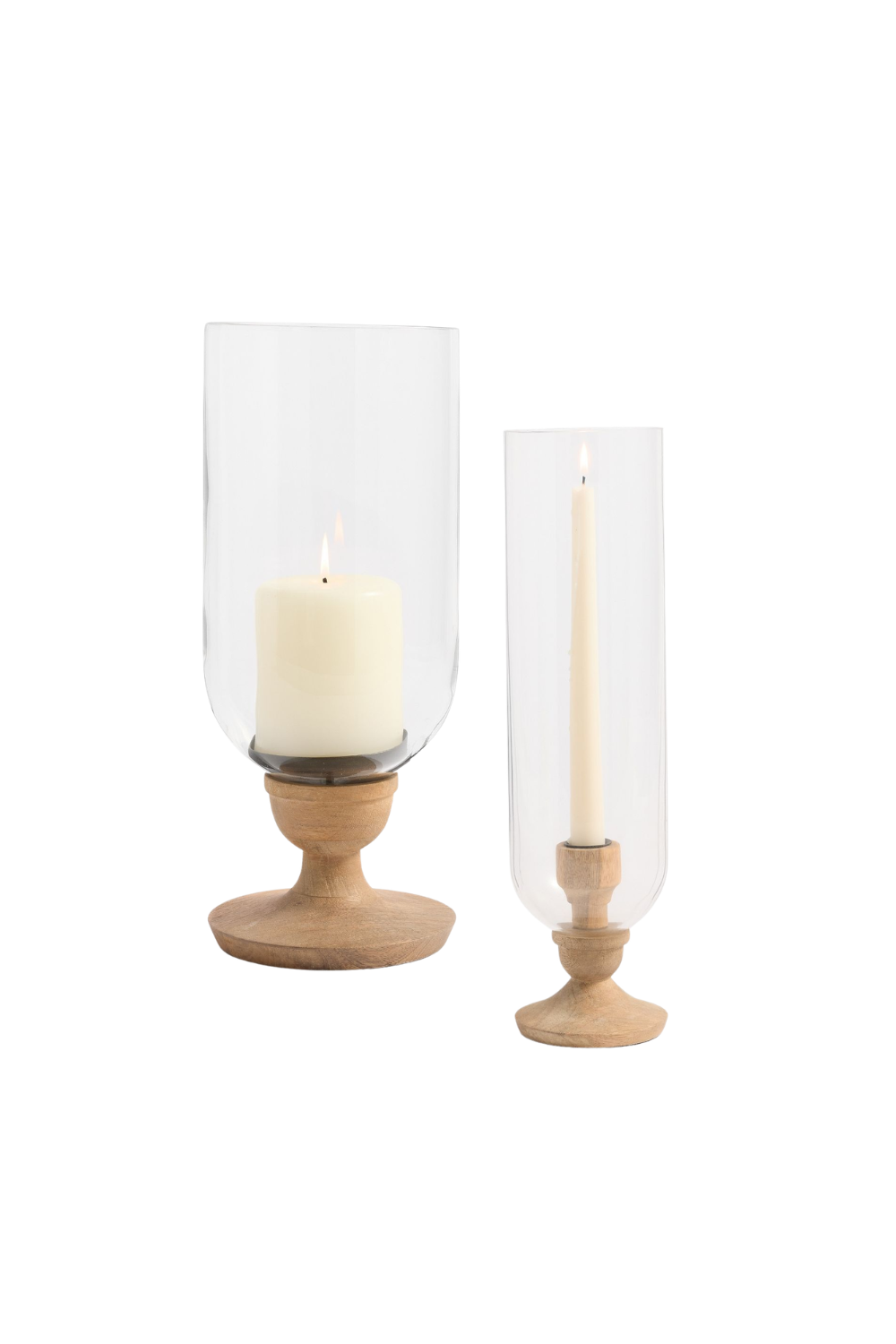 Two glass candle holders with wooden bases, each containing a lit candle, set against a white background.