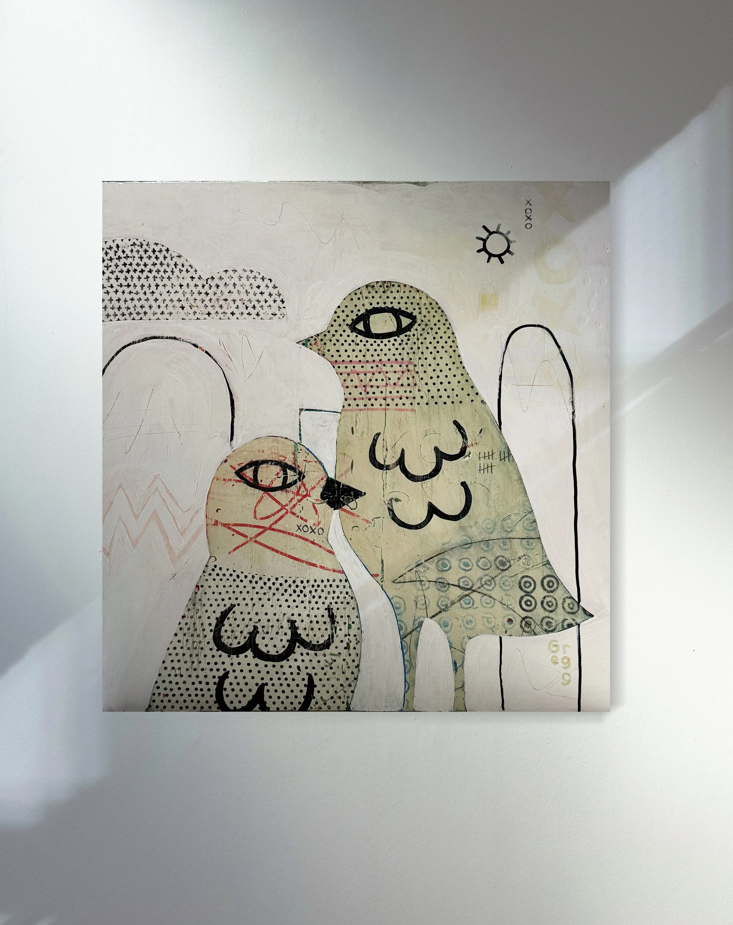 A mixed media collage featuring abstract shapes, patterns, line drawings, and handwritten text on textured paper, including an eye, and a small sun drawing, mounted on a white background.