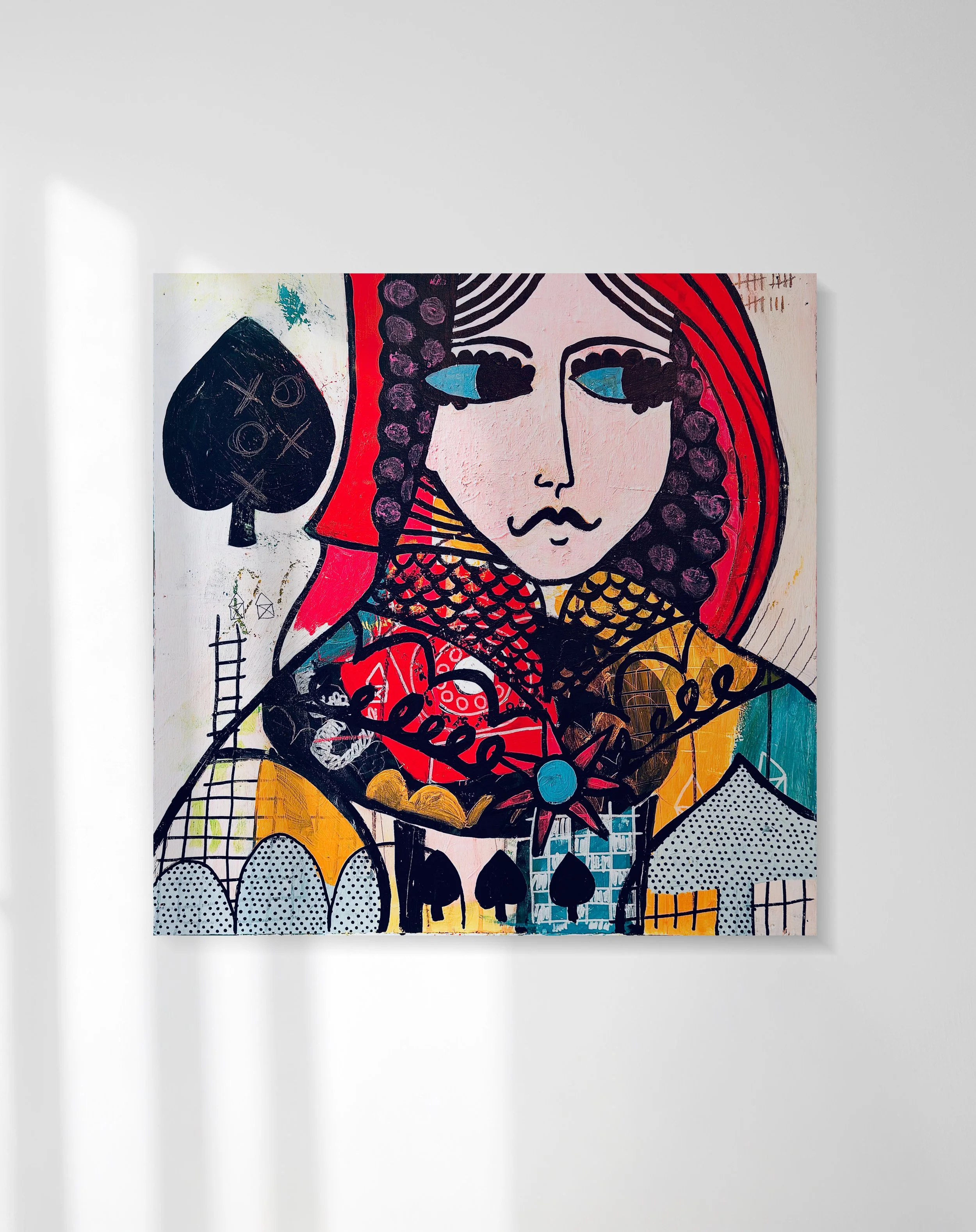 Colorful abstract artwork of a woman's face with blue eyes, surrounded by vibrant patterns and shapes, including black spades, polka dots, and cross-hatch designs.