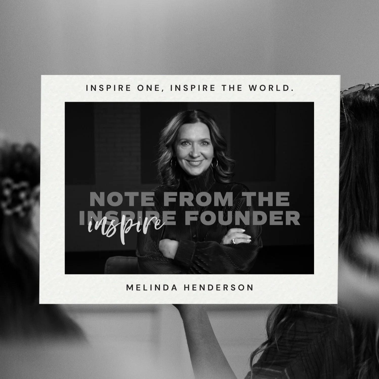 Book cover titled 'Note from the Inspire Founder' by Melinda Henderson, featuring a woman with shoulder-length hair, wearing a dark top, crossing her arms, smiling, in black and white photo. Inspirational message 'Inspire one, inspire the world' at top.