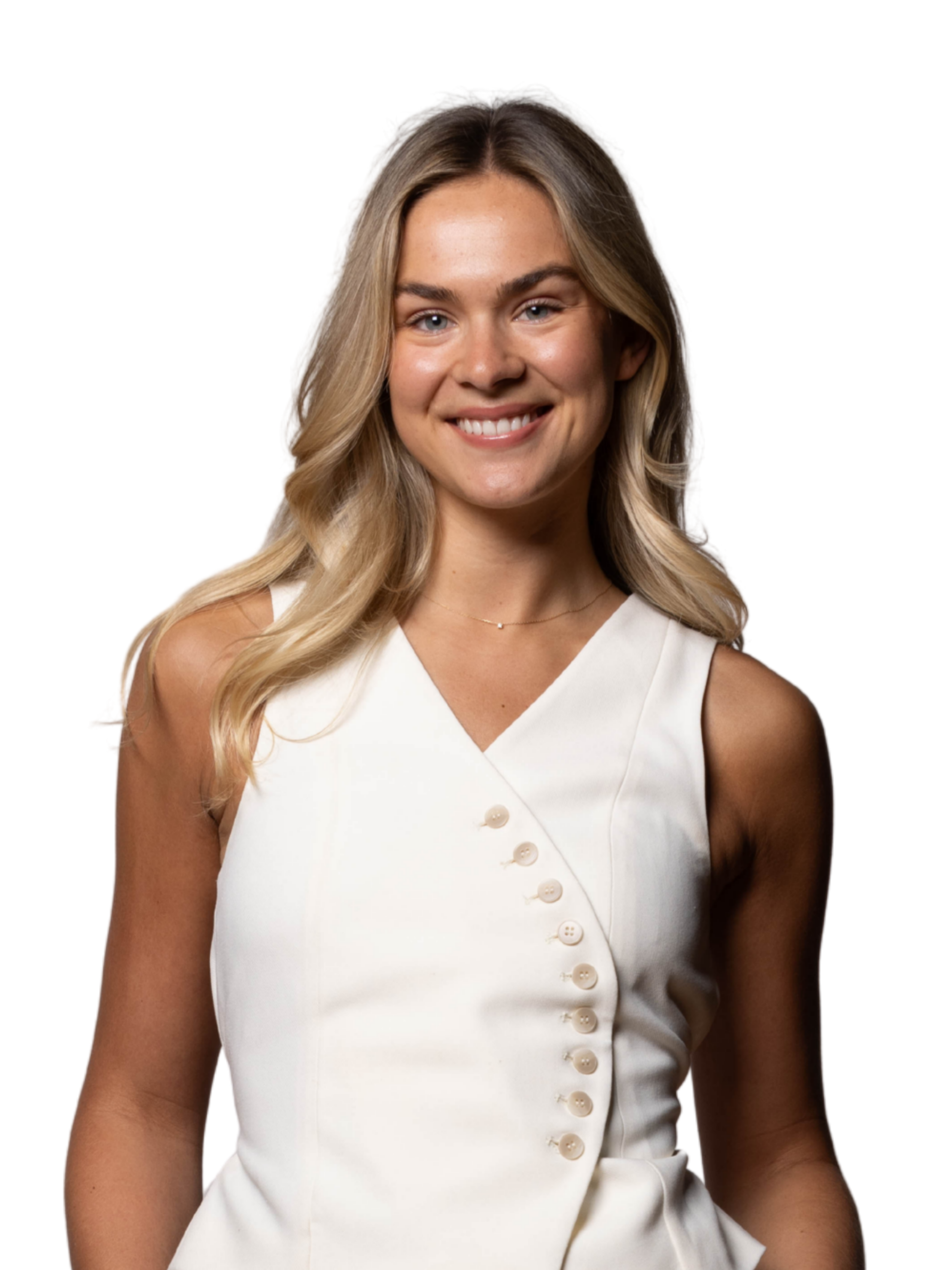 Portrait of a young woman with long, wavy blonde hair, wearing a white sleeveless dress with buttons on the side, smiling at the camera against a white background.