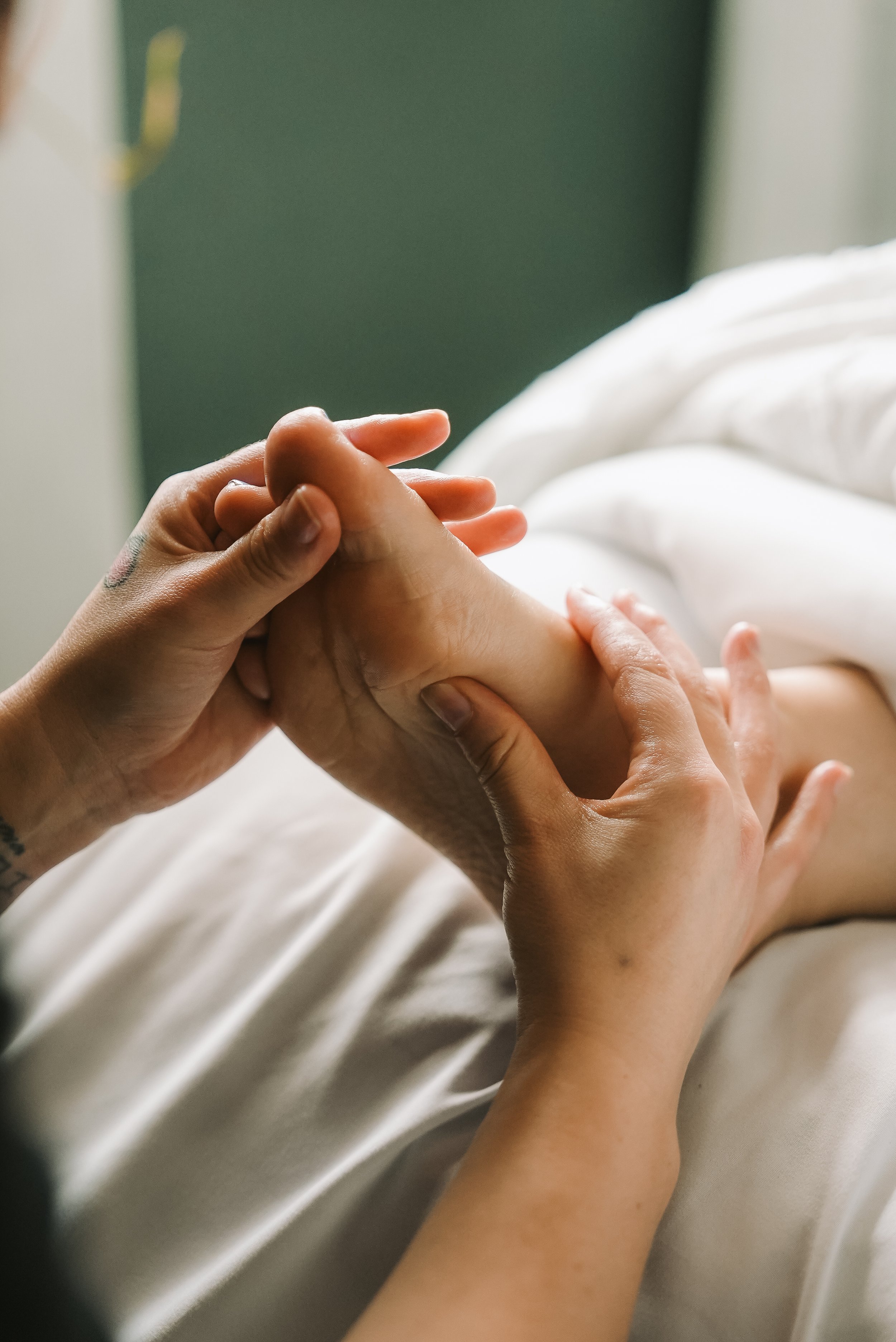 Person holding another person's hand.