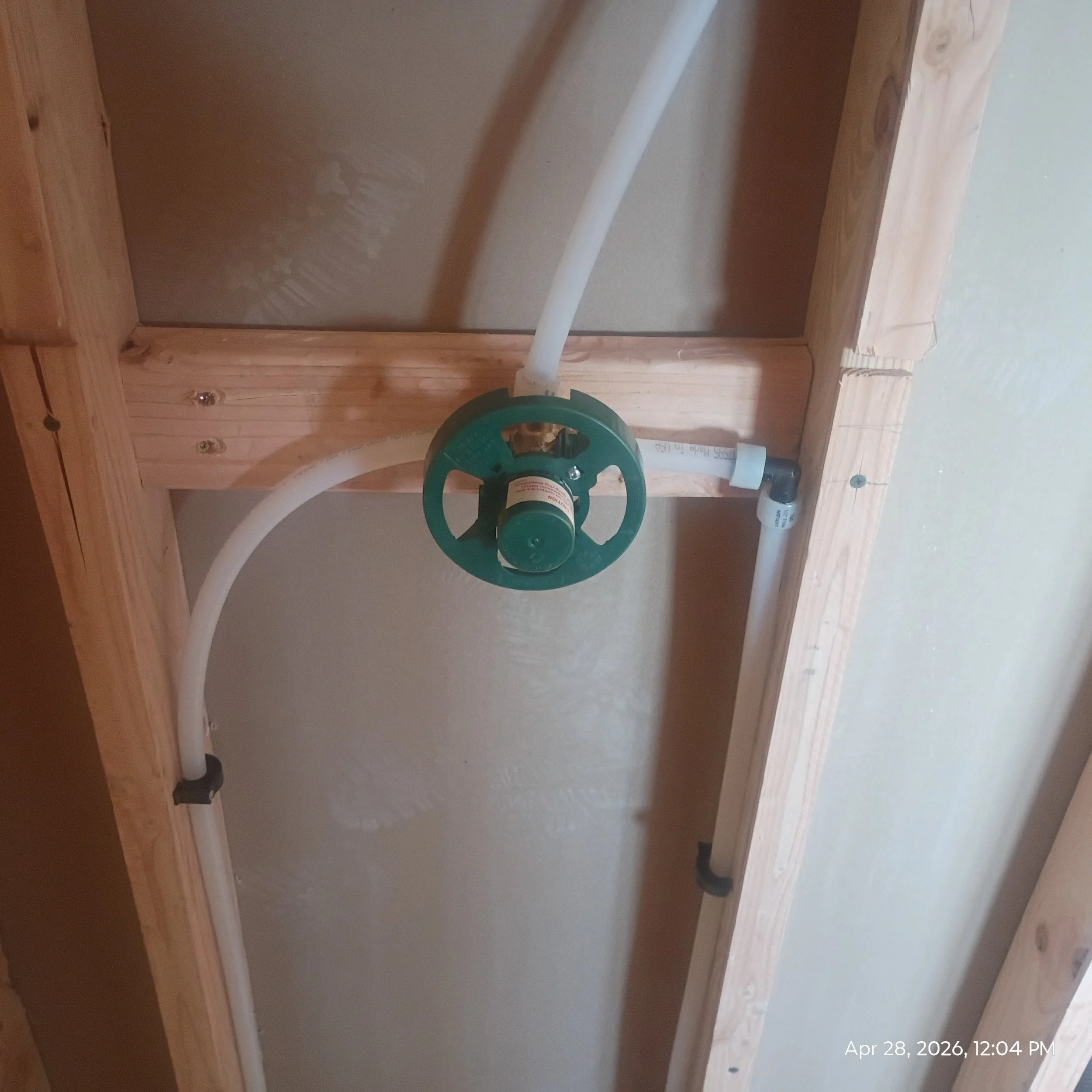 a simple shower with 1 head .