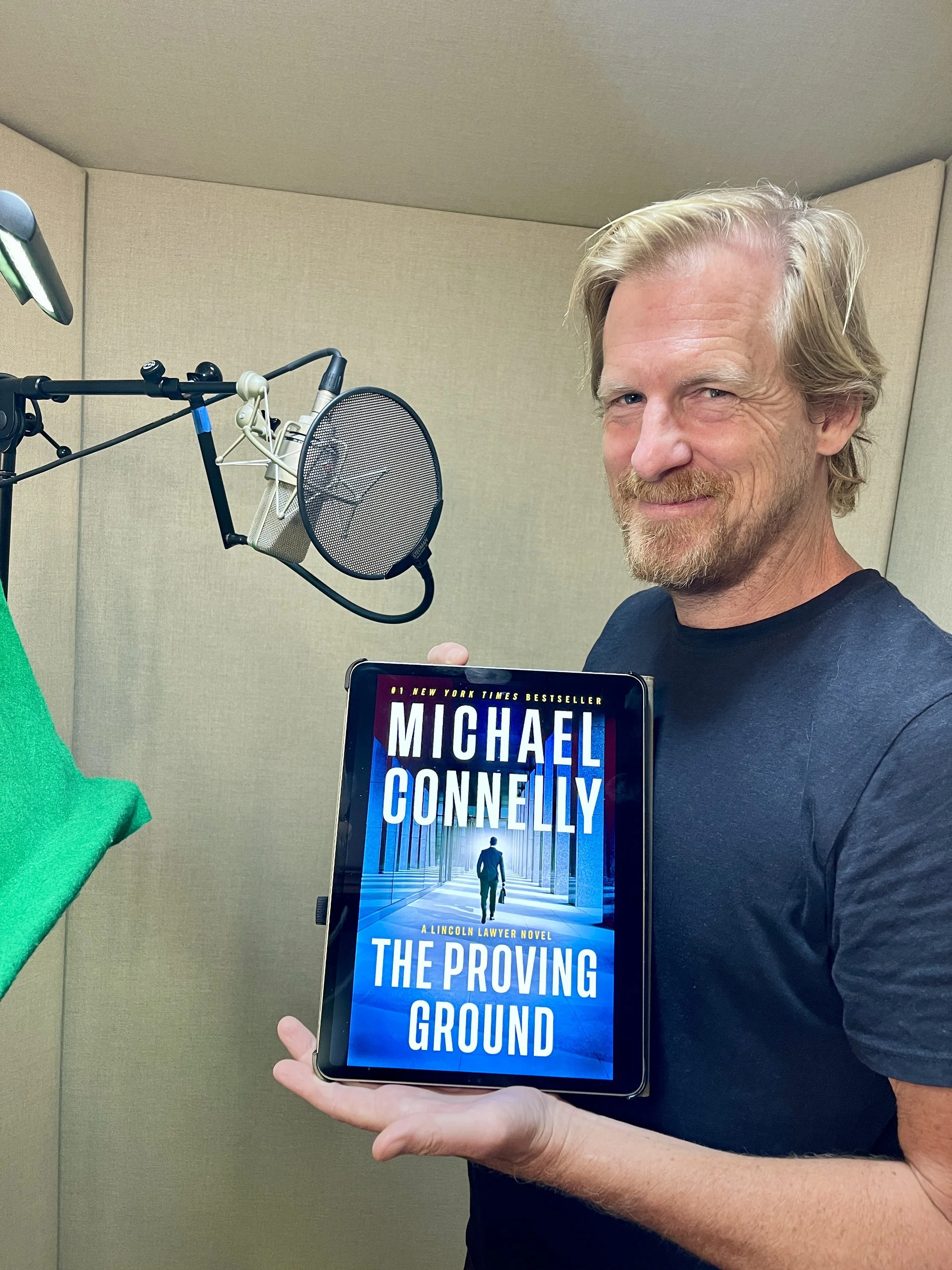 Peter Giles narrating Michael Connelly's The Proving Ground, a Lincoln Lawyer thriller.