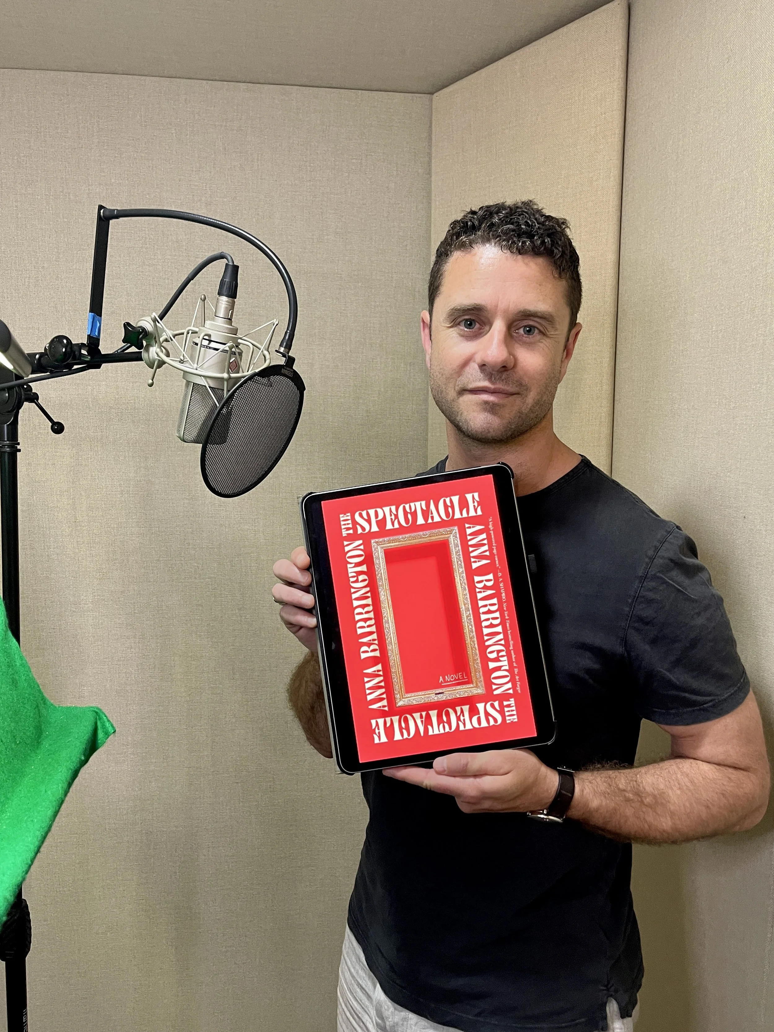 Nick Thurston narrating the social thriller THE SPECTACLE by Anna Barrington.