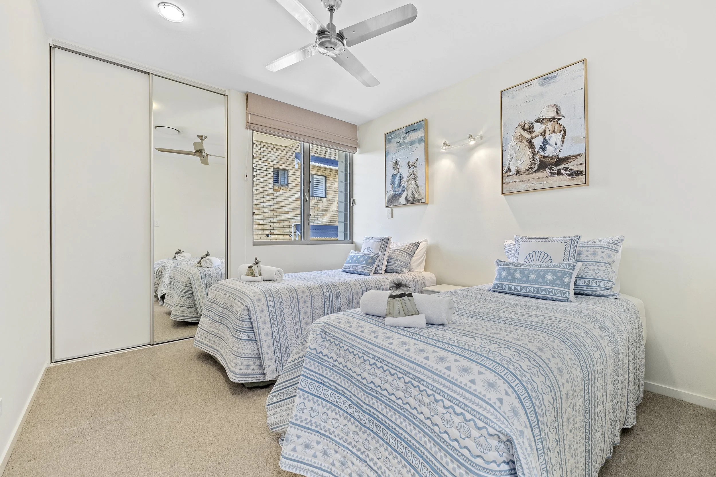 Twin bedroom with two extra-long single beds at Ming 3 , Kingscliff.
