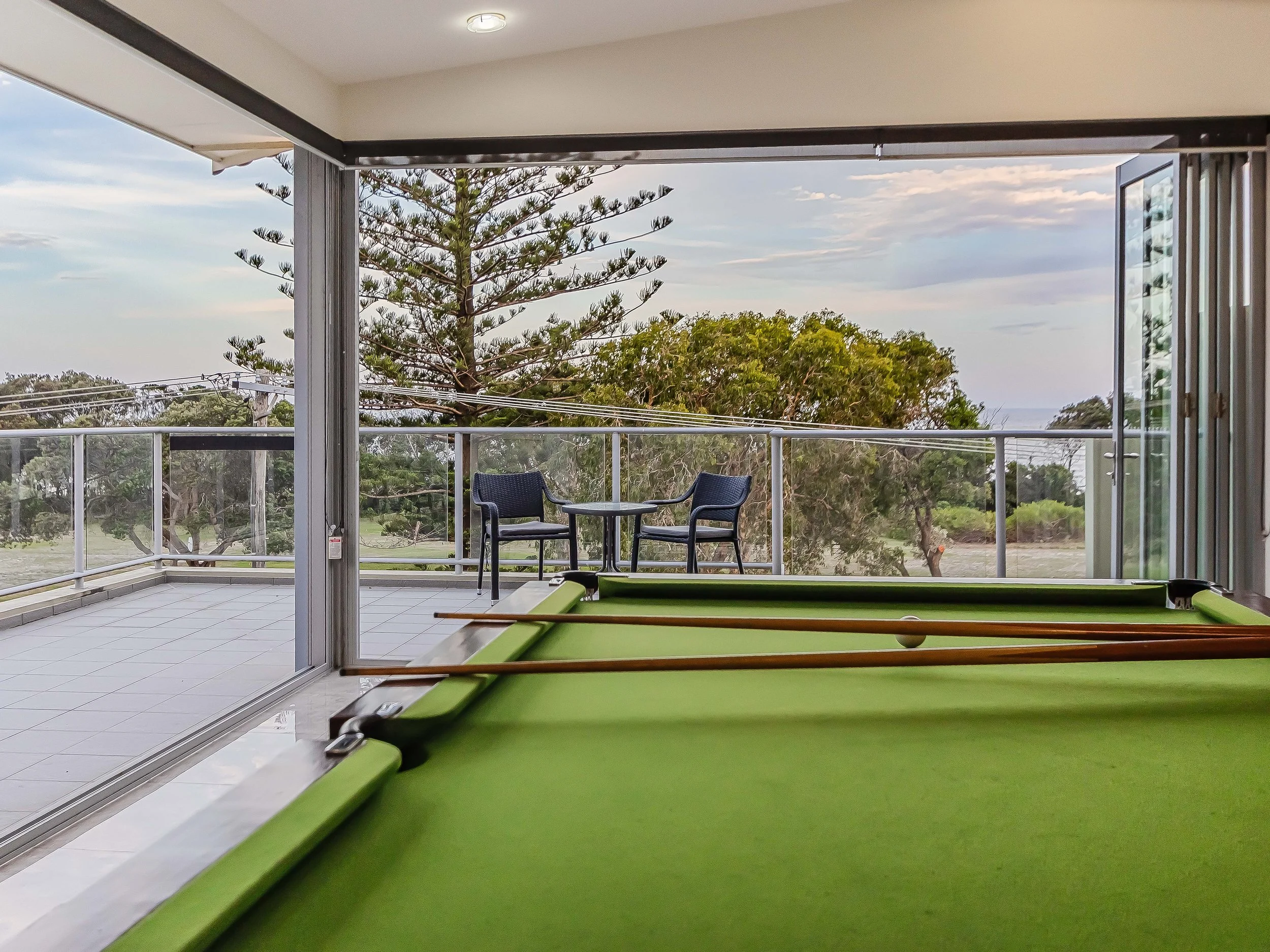Discover the private rooftop retreat at MING 3 in Kingscliff, with ocean and park views, billiards, table tennis and space for sunset drinks and family fun.