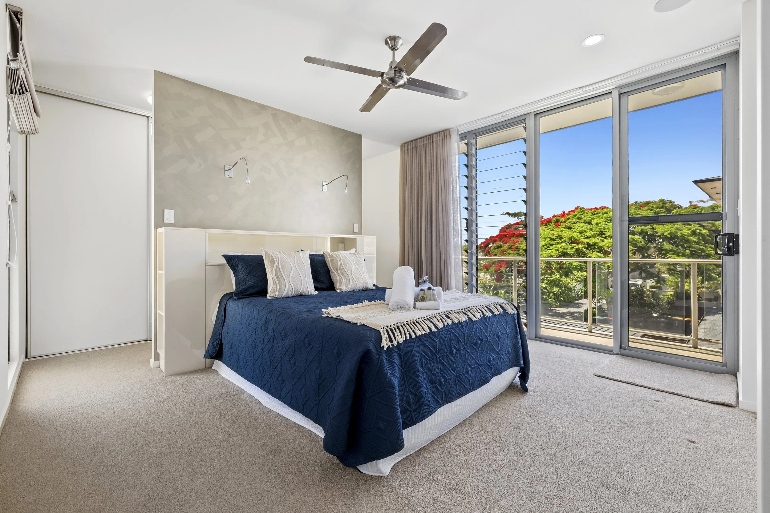 Spacious Master bedroom at MING 3 Beachfront on Marine Parade, with natural light and private balcony access.