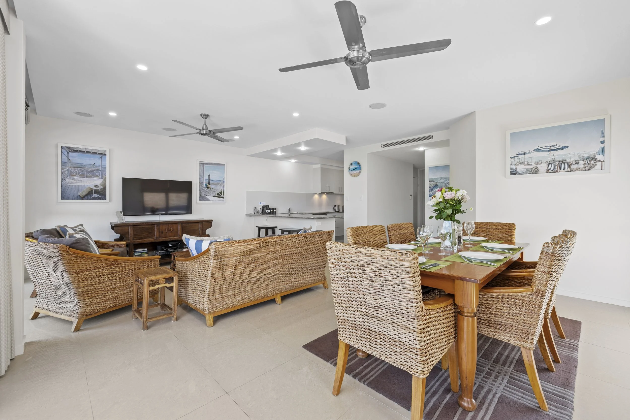 Open-plan living and dining area with generous seating for families and groups at MING 3 in Kingscliff.