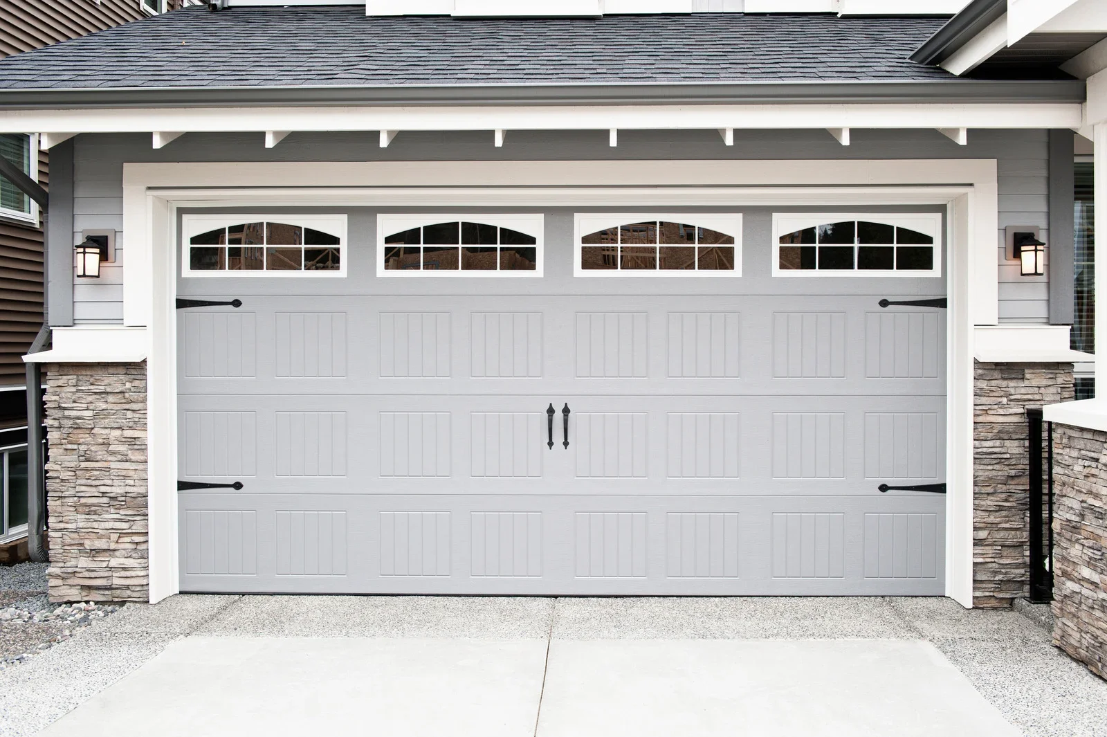 Garage Door Going Up Crooked or Uneven? What It Means