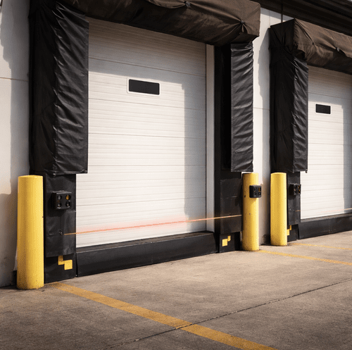 commercial door sensing edge under infrared photo-eye beam