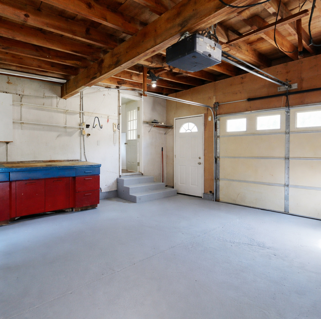 Residential garage door openers side-by-side on showroom floor