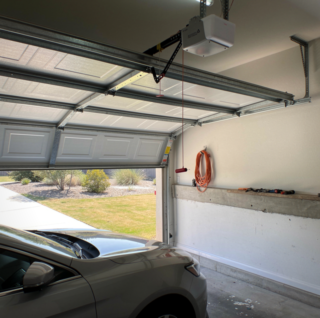 red garage door release cord stranded car inside