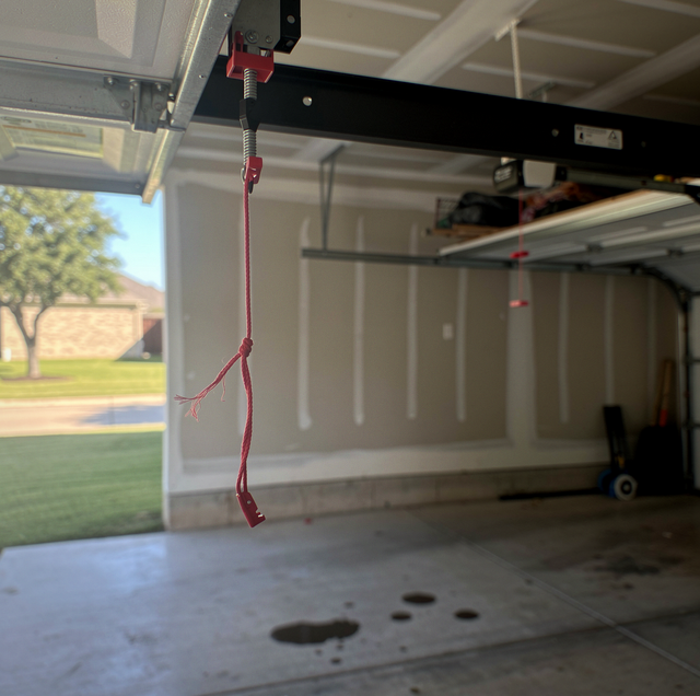 red garage door release cord snapped at handle