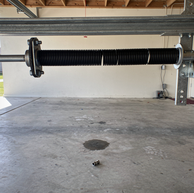 residential garage door torsion spring slipped on shaft