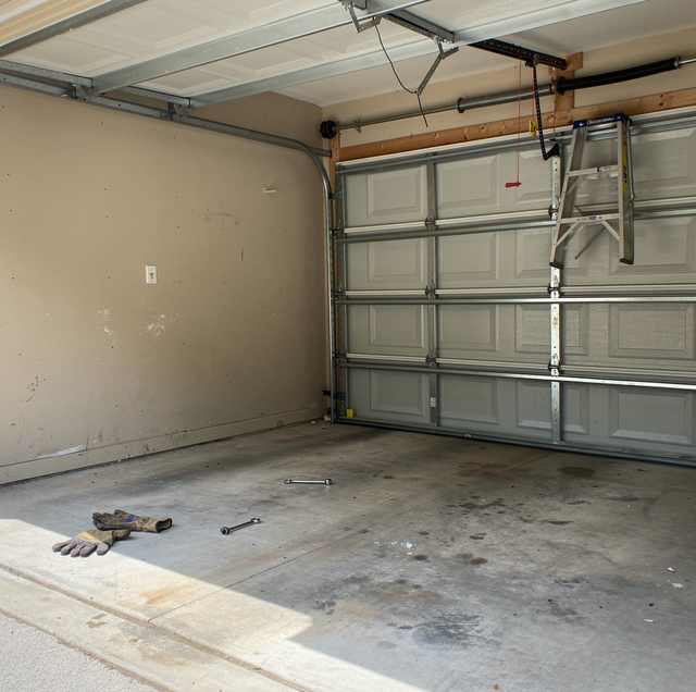 torsion spring unwound from garage door shaft