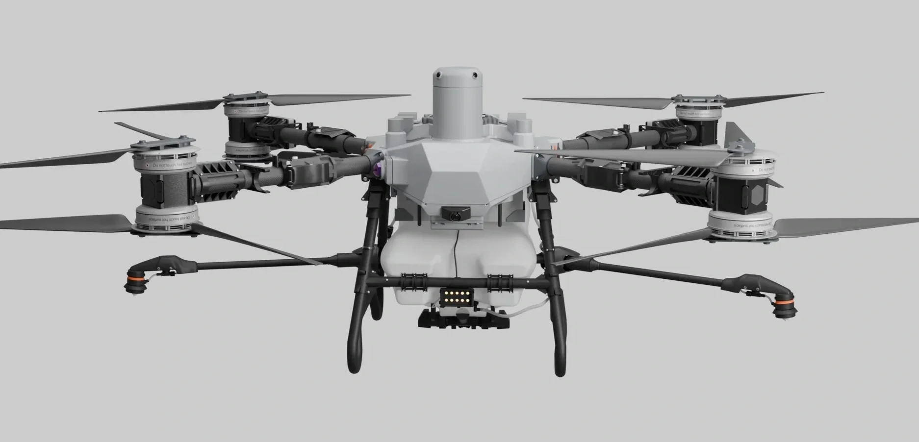 A multi-rotor drone with four propellers, camera, and sensors against a plain background.