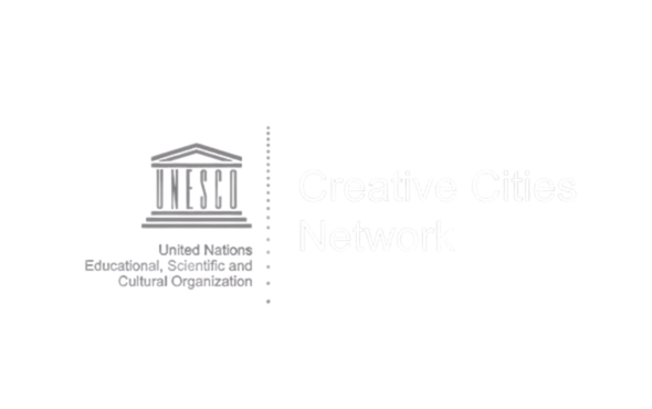 United Nations Educational, Cultural and Social Organization logo with a classical building icon and the text 'Creative Cities Network'.