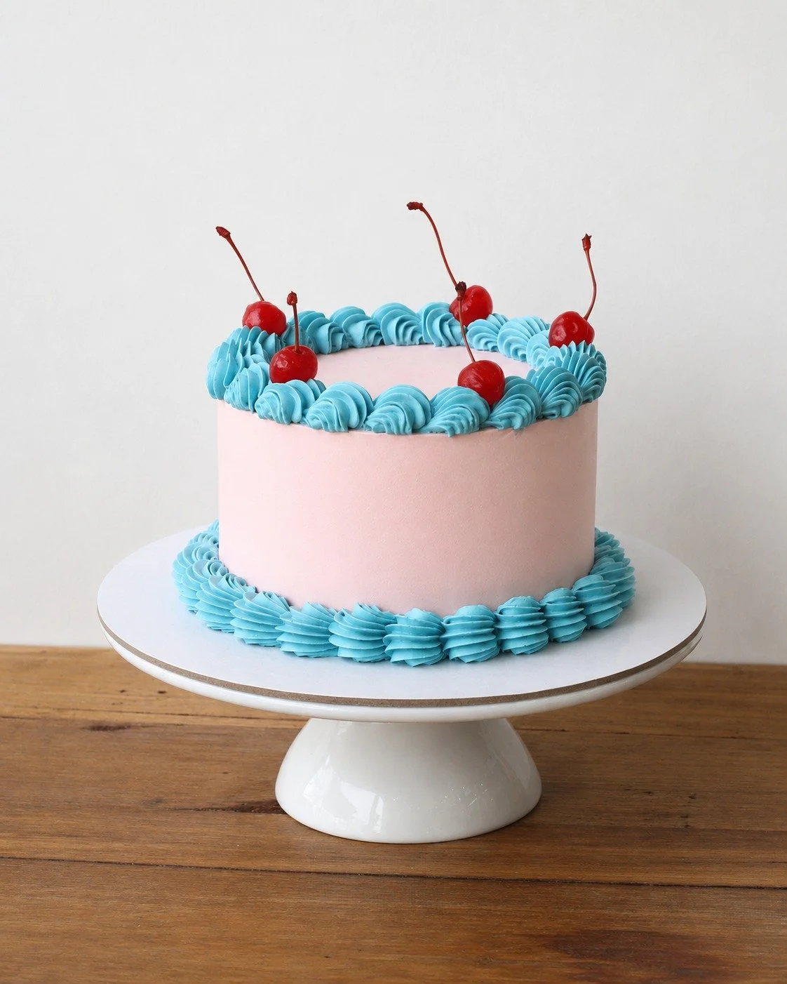 Pink and blue themed retro round available online.