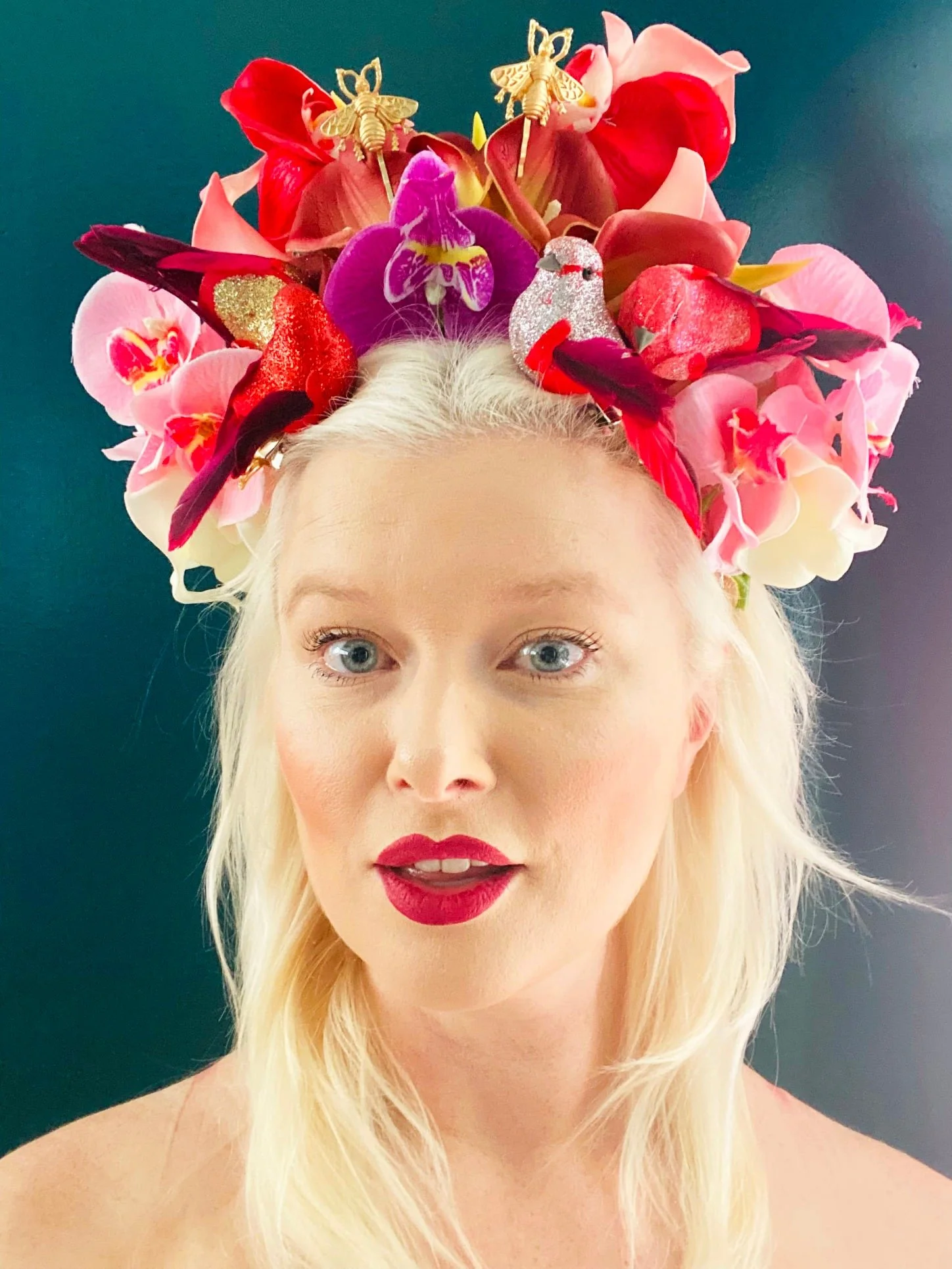 Color floral studio headshot of San Francisco advertising creative director Kate Catalinac.