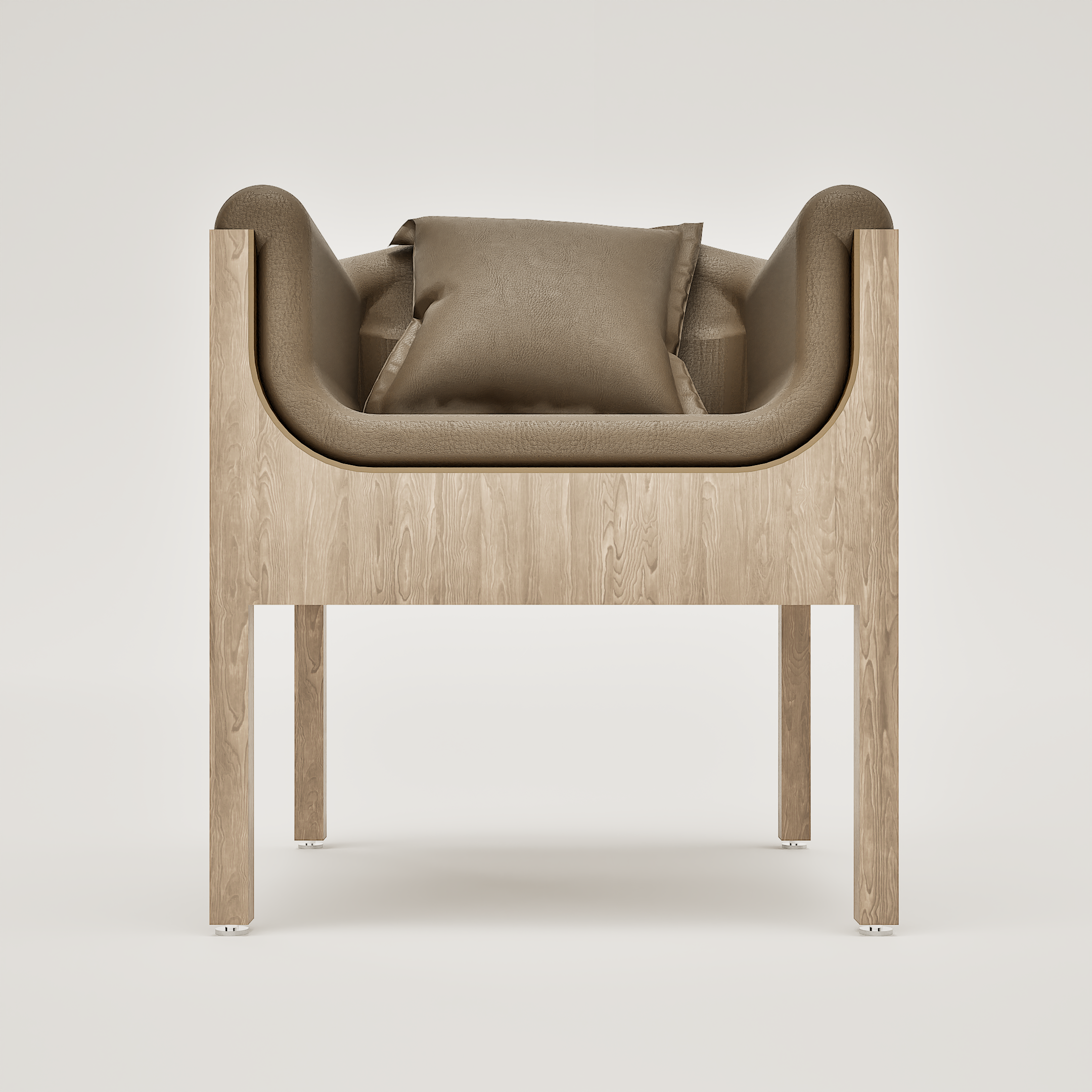 Un canapé beige avec un coussin assorti, placé sur un support en bois clair avec des pieds métalliques, contre un mur blanc.
